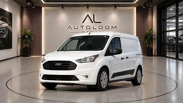 A cargo van presented in an AutoLoom showroom environment